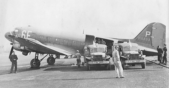 Two WC-54 ambulances deliver their load of patients in need of additional hospitalization for air evacuation to the Zone of Interior. At the time (December 1944) the 74th General Hospital was operating as a Holding Hospital preparing patients for transfer to the United States (of particular interest are the vehicles' markings, with CZ designating Communications Zone).Courtesy Gregory Sobieski.