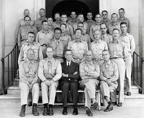 Colonel Arthur H. Nylen and Staff in front of the 33d General Hospital main building in Rome (the civilian is Professor Rafael Bastanelli). Photo taken during the unit's stay in Rome, Italy, June 1944 - September 1944. 