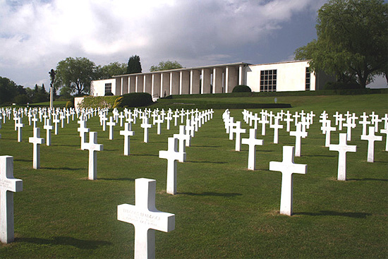 View showing headstones and memorial at the Henri-Chapelle American Cemetery.