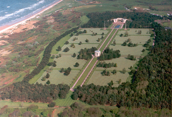 Aerial view showing the Normandy American Cemetery, overlooking Omaha Beach.
