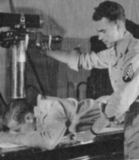 An unidentified technician prepares an x-ray at the 26th Gen Hosp.
