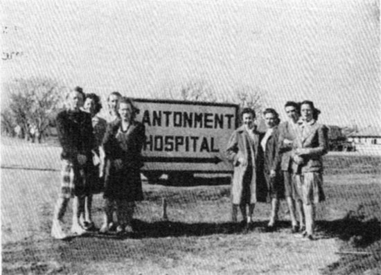 Several members of the 26th's female staff pose in front of the Fort Sill Cantonment Hospital. 