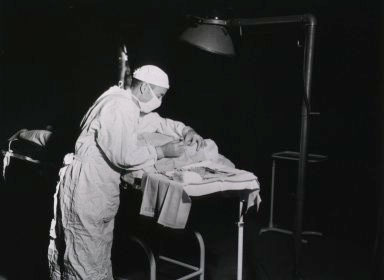 Picture illustrating Surgeon at work in the Operating Room.