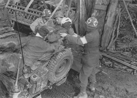 Another vintage photograph illustrating the use of the 1/4-ton truck for evacuation of casualties.