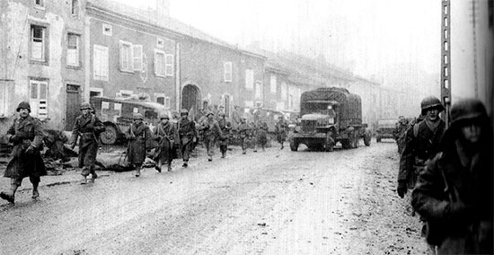 Two WC-54 3/4-ton ambulances on standby in front of a Clearing Station in the region of Metz, Lorraine, France.
