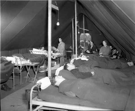 Patients at the 12th Evacuation Hospital, Carmarthen, Wales, United Kingdom, where the organization operated from October 1943 until March 1944.