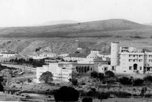 Another view of the main building (the Grand Hotel, hot water spring and spa resort) at Sidi Bou Hanifia, Oran area, Algeria, January-February 1943.