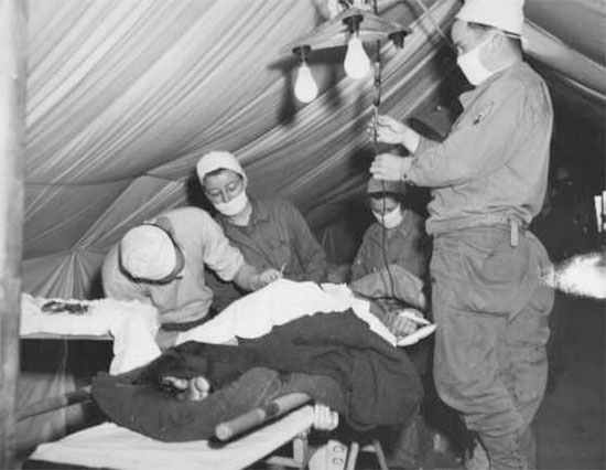 October 1944, France. Partial view illustrating a ward of the 10th Field Hospital in full operation.