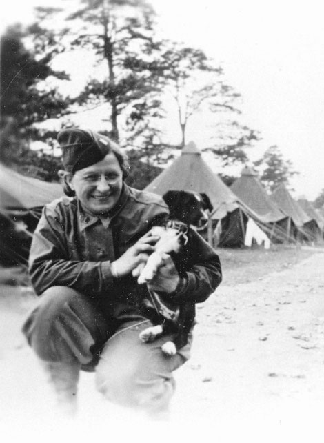 Portrait of 1st Lieutenant Stella C. Book with “Fargo”, taken during bivouac at Fargo Plains, a tented camp situated in Wiltshire, England, May-June 1944. 