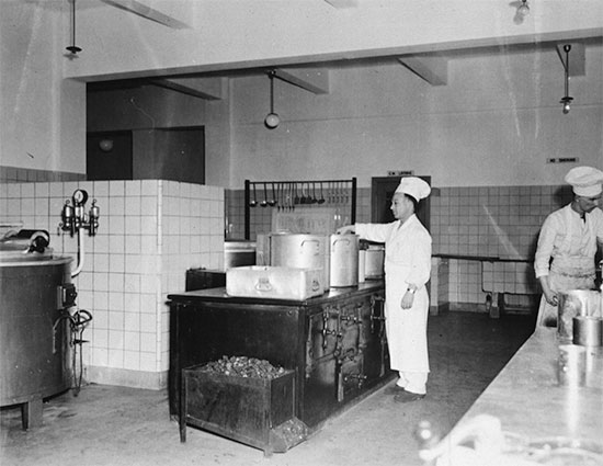 View of the centralized kitchen set up by the 25th General Hospital while stationed at Tongres, Belgium, summer of 1945.