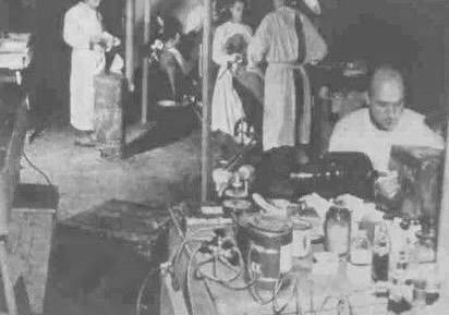 Picture illustrating part of the maxillo-facial clinic (background) and the dental clinic (foreground). The location, a tented hospital, could be Bouc-Bel-Aire, in Southern France.