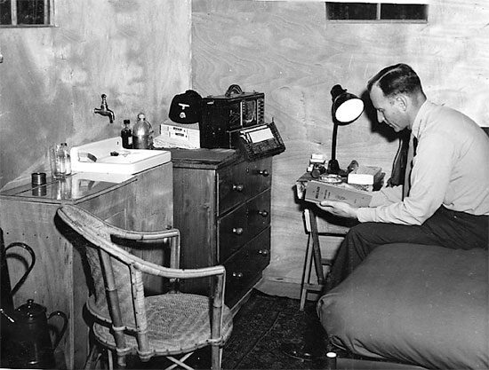 Picture illustrating the Commanding Officer of the 27th Evacuation Hospital in his quarters. Colonel Charles B. Puestow, MC, O-267687, would command the unit from January 1, 1943 to its inactivation December 10, 1945 (with a small interruption). Courtesy UIC