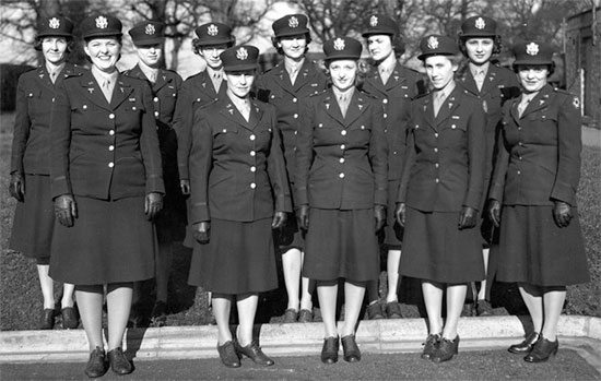 Vintage photo illustrating a group of Army Nurse Corps Officers of the 298th General Hospital while the unit was operating in the United Kingdom.