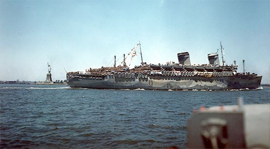 Picture illustrating the USS West Point, AP-23, the troopship which carried the main group of the 189th General Hospital across the Atlantic and to France (this particular picture illustrates the ship on her return to New York with troops from Europe 11 July 1945). 