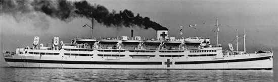 Another photograph illustrating USAHS Louis A. Milne. Of special interest are the official Geneva Convention markings adorning the ship, anf the positioning of the 12 lifeboats and the 6 life rafts on board.