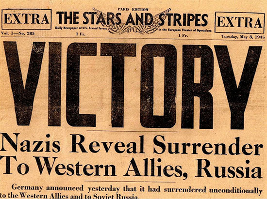 Copy of vintage Stars and Stripes, Paris Edition, dated Tuesday, 8 May 1945, announcing V-E Day.